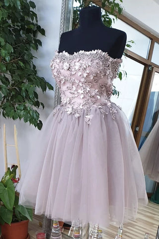 products/a_line_strapless_tulle_homecoming_dress_with_appliques_a30dffec-dfcd-401c-954b-4442de116c84.jpg