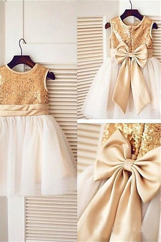 products/ivory_flower_girl_dress_with_gold_sequins.jpg