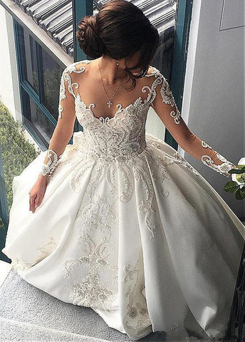 products/see_through_long_sleeve_wedding_dress_with_appliques.jpg